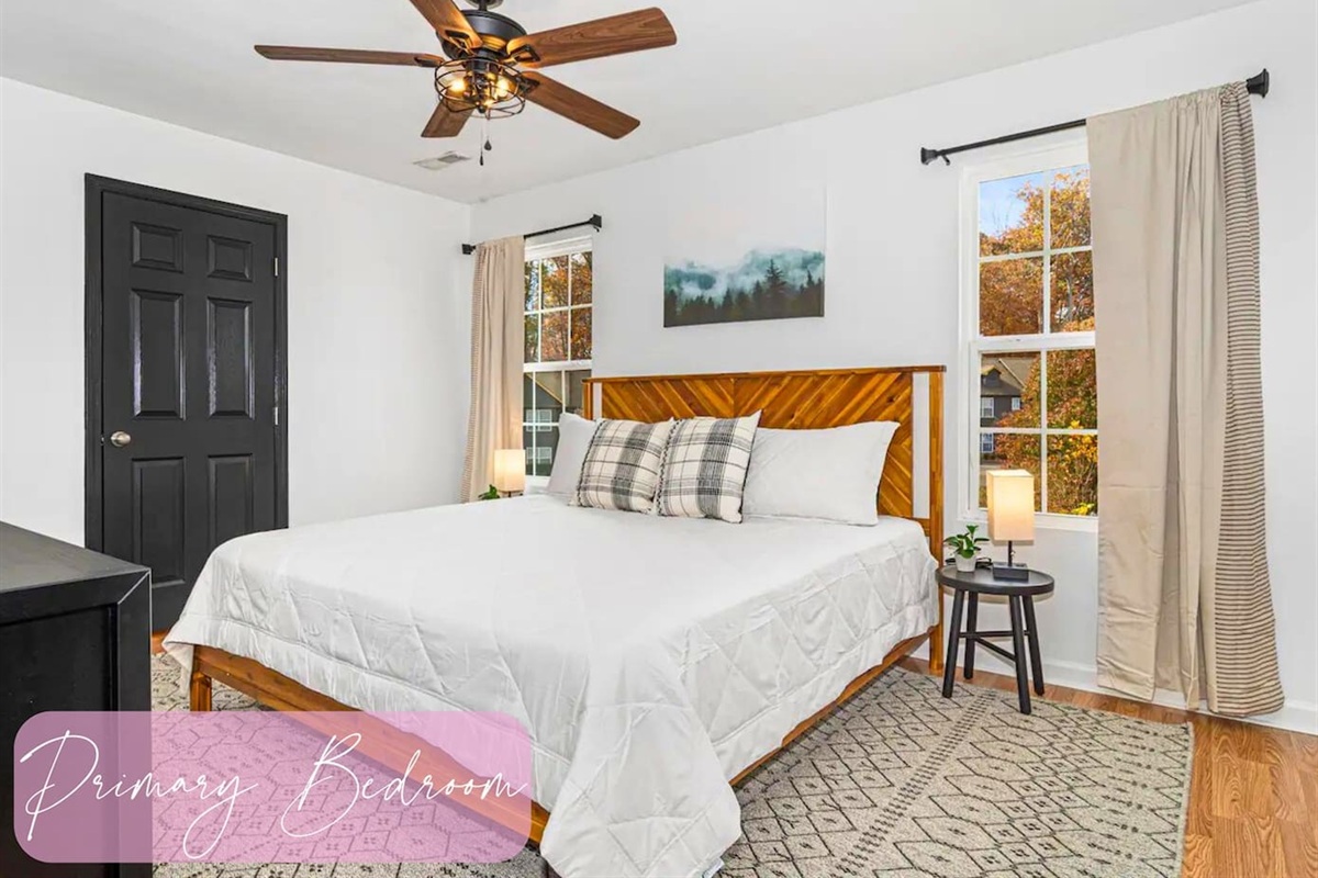 Drift off in the primary bedroom where comfort is key with the king bed and comfy linens; snuggle up in this calm, bright space after a day full of discovery.