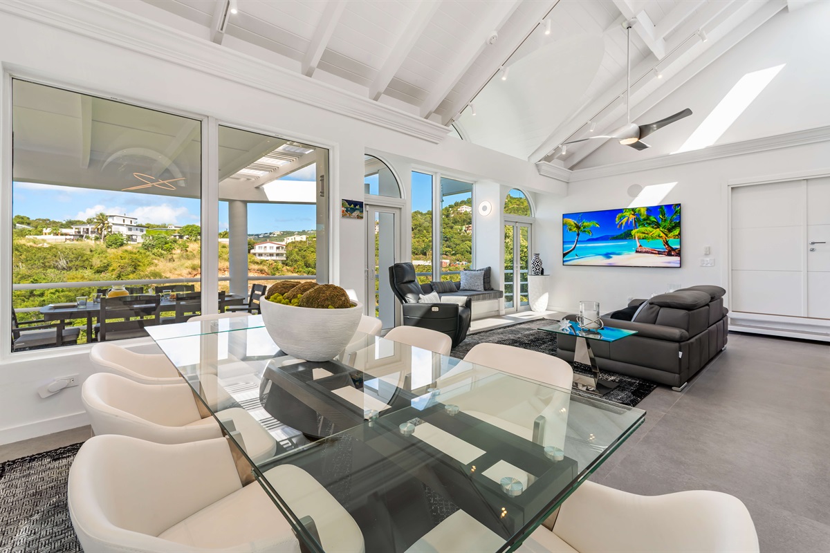 Bright living room with comfy seating and Smart TV