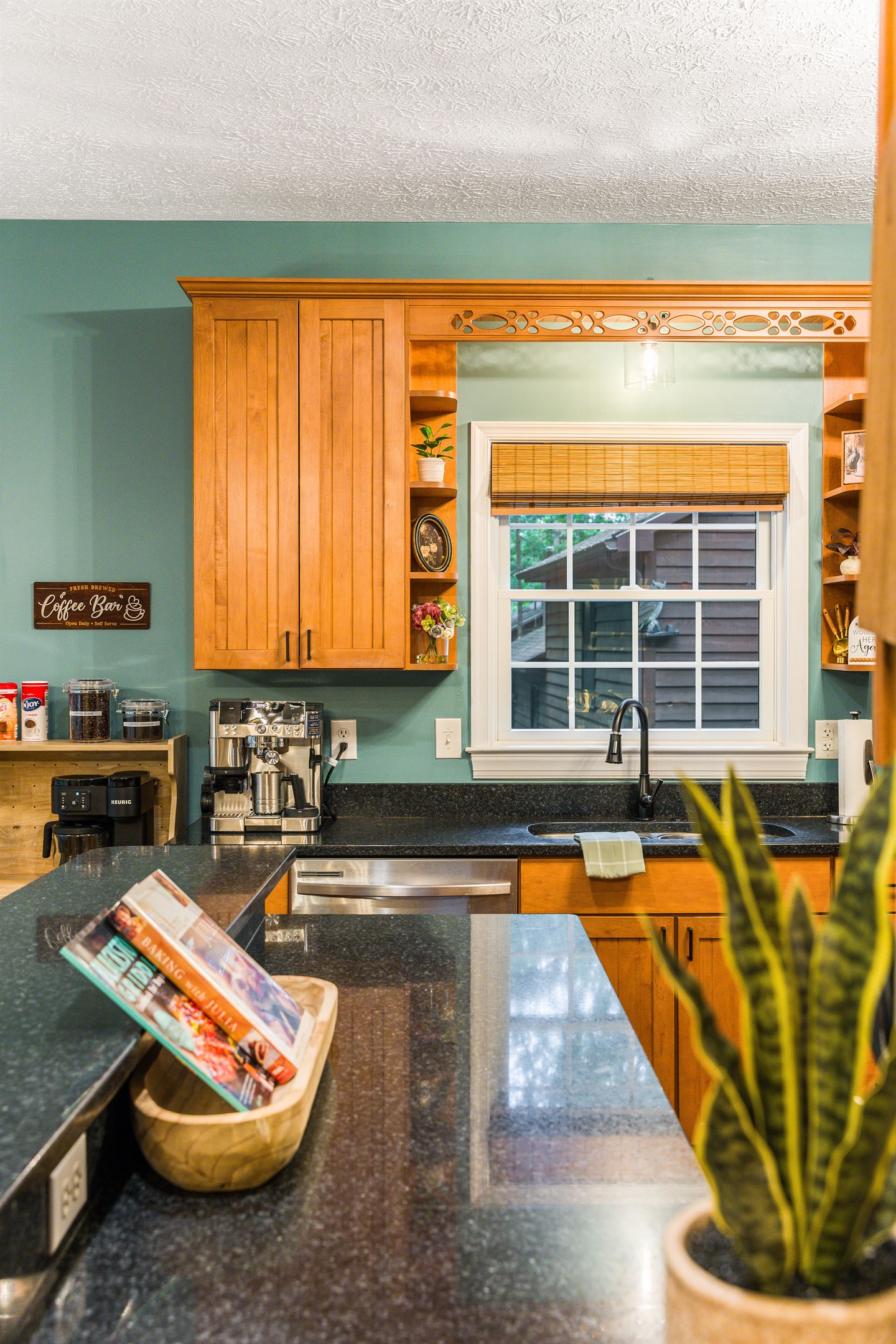 Bright, spacious kitchen with plenty of counter space for family cooking and easy cleanup