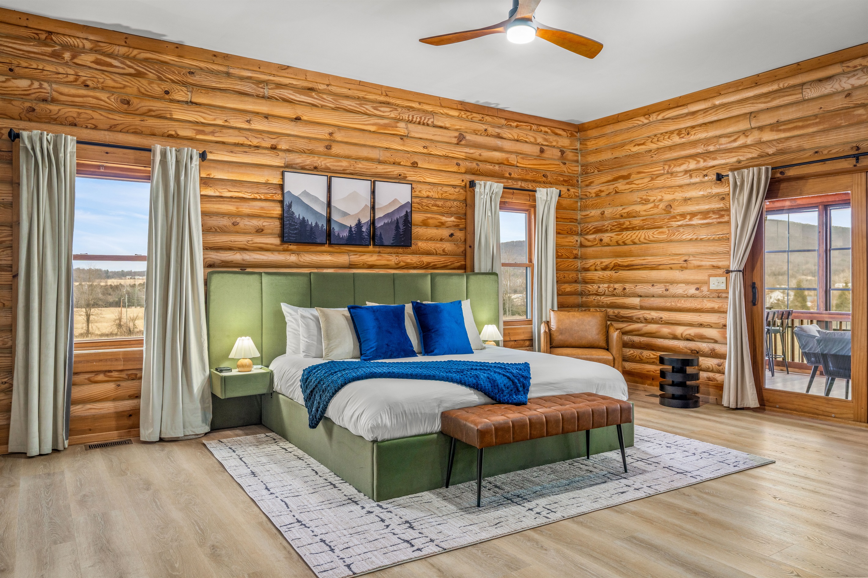 Wake up to natural light in the king primary suite featuring private ensuite bathroom, bedside coffee bar, and a room designed for restful mountain mornings