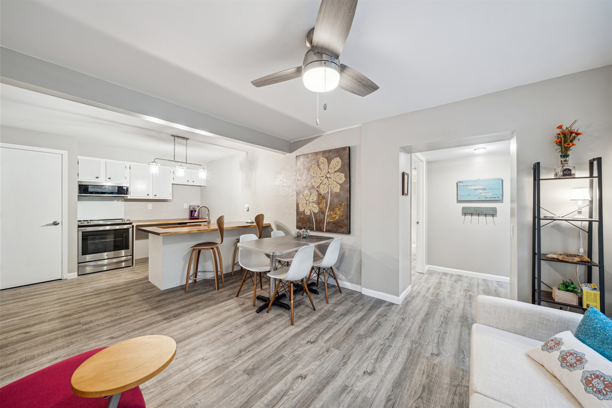 Morning Glory has a "coffee shop style" common area with  a cozy love seat, funky desk chair and dining areas.