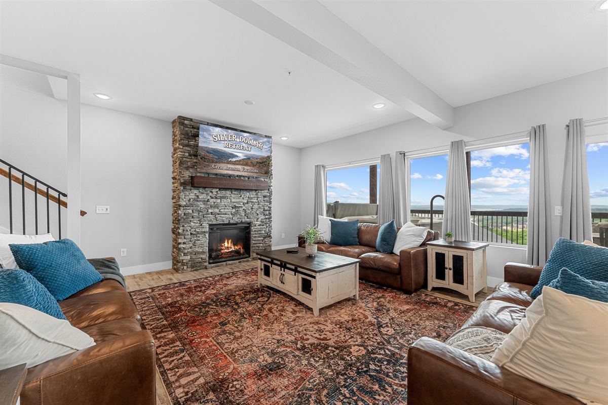 Great Room with electric fireplace and 65 inch smart TV