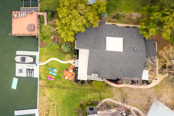 Everything you need for lakefront fun—kayaks, a boat dock, fire pit, and room to roam—all just steps from your back door.