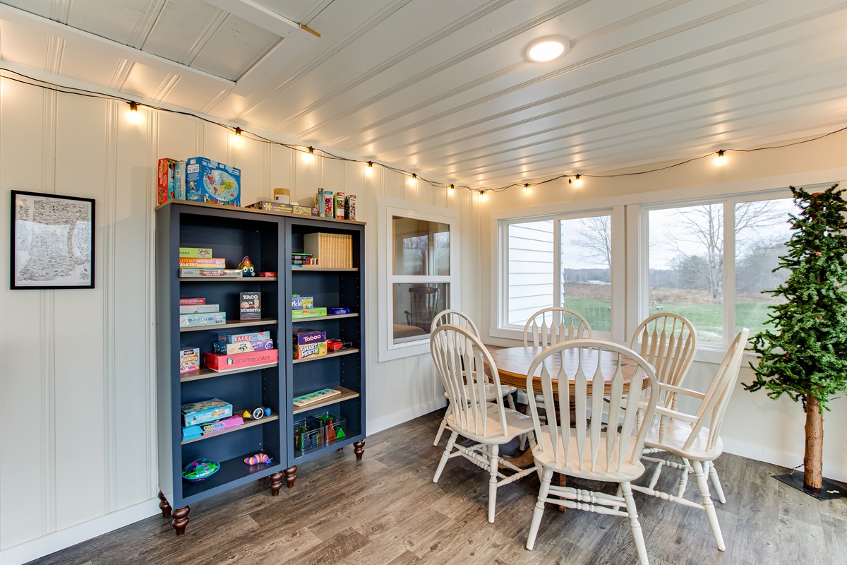 We provide games and puzzles for all ages!  The game table is custom painted with a checkerboard top.