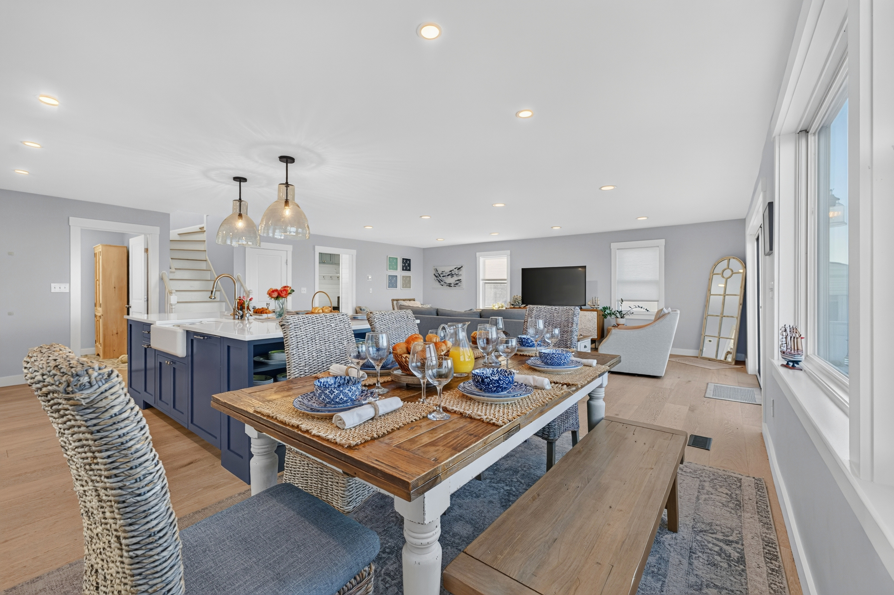 Open-concept main living space designed for gathering, dining, and relaxing