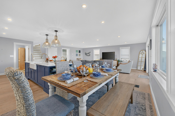 Open-concept main living space designed for gathering, dining, and relaxing
