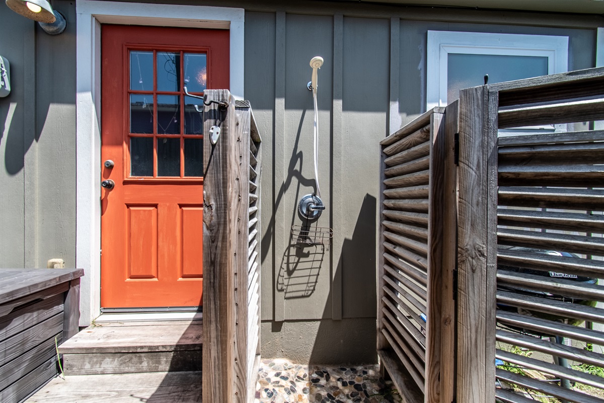 Outdoor shower off back of the cottage