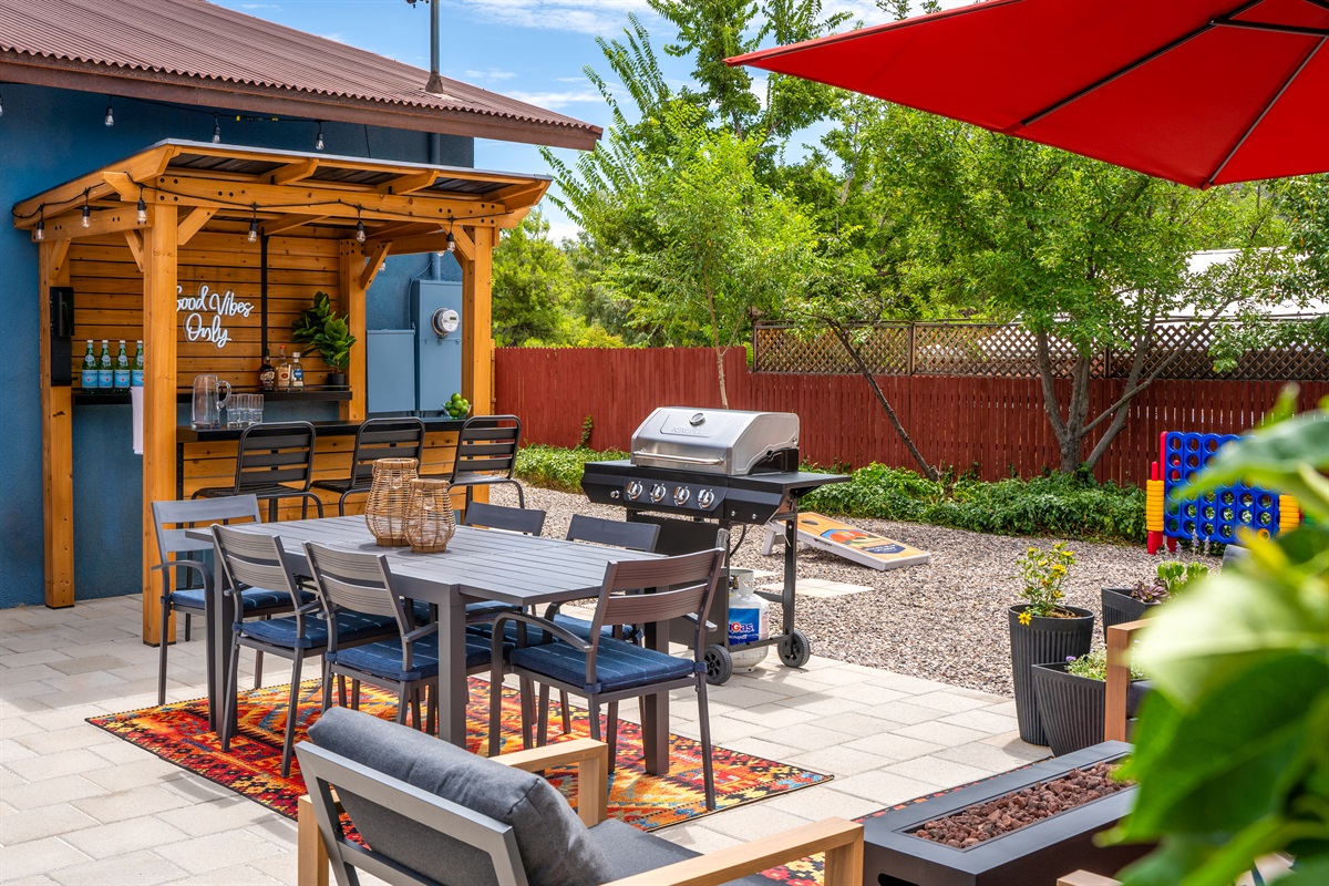 An outdoor haven where relaxation meets fun—grill, games, and good vibes only.