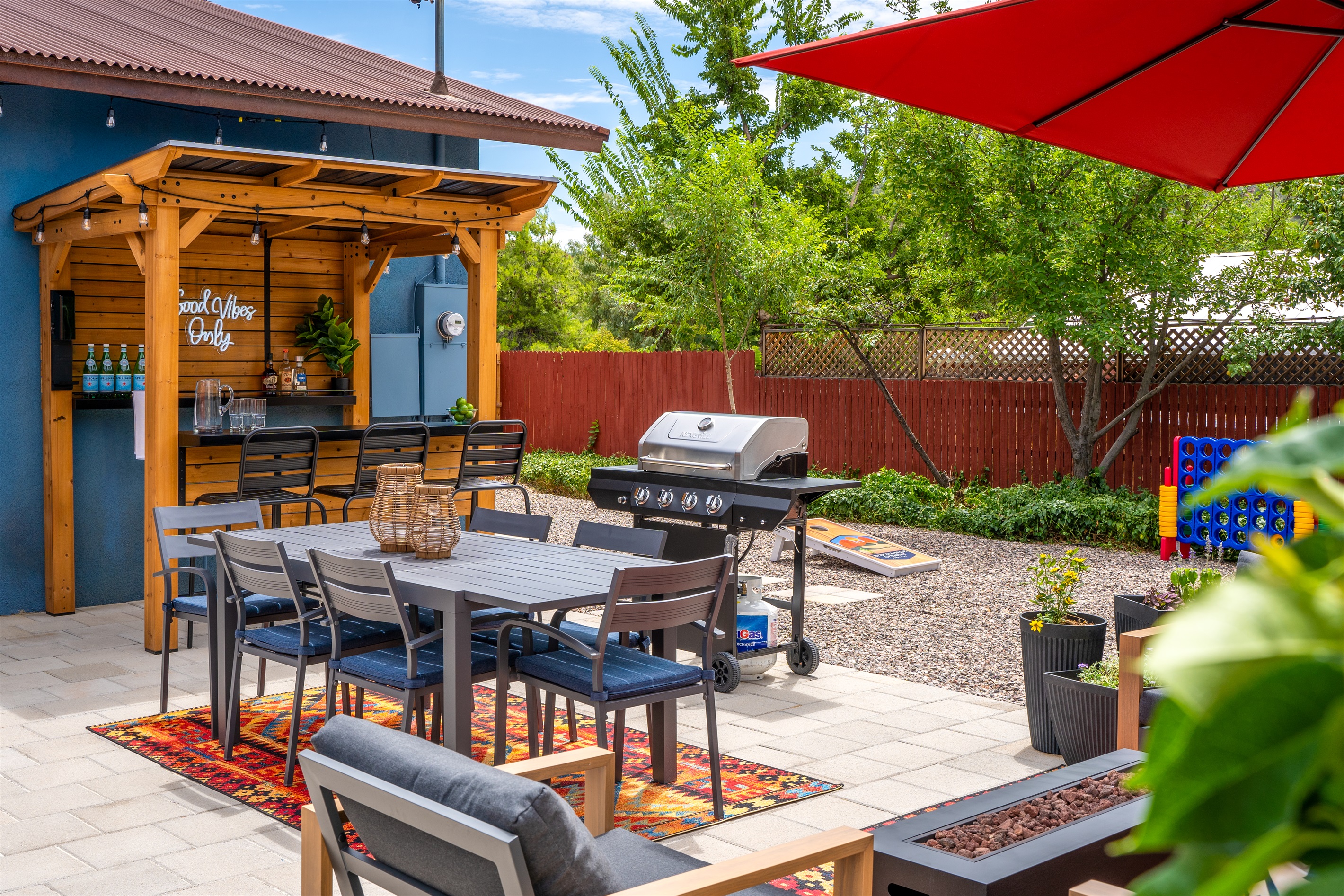 An outdoor haven where relaxation meets fun—grill, games, and good vibes only.