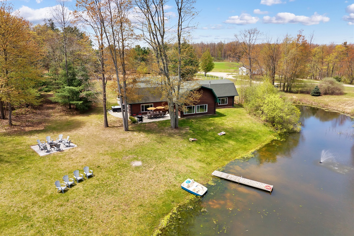 Aerial view of our home, dock, pond and firepit.