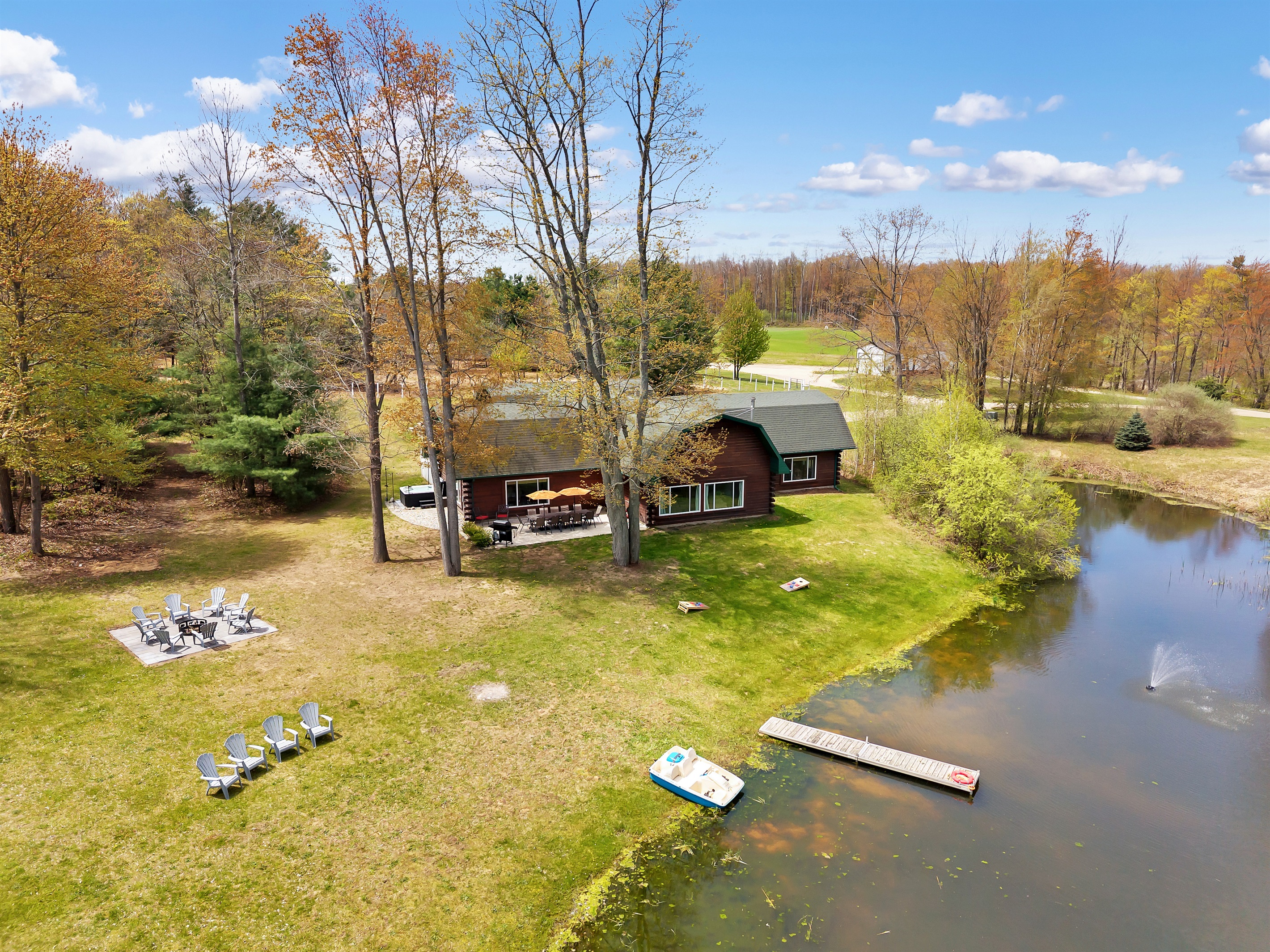 Aerial view of our home, dock, pond and firepit.