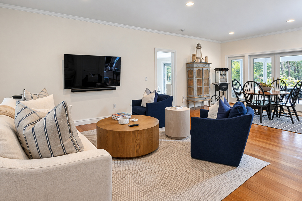 Living room with TV and dining area
