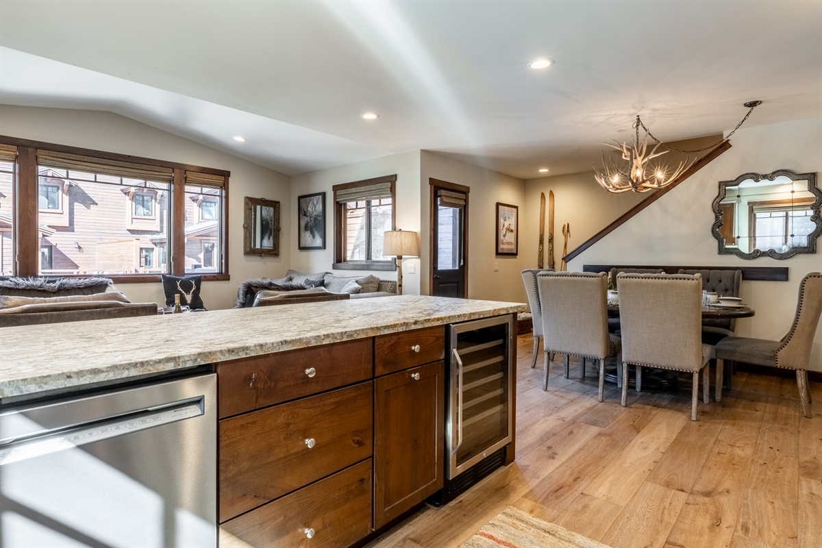 The breakfast bar adds extra seating and becomes a natural hub for conversation while meals come together.