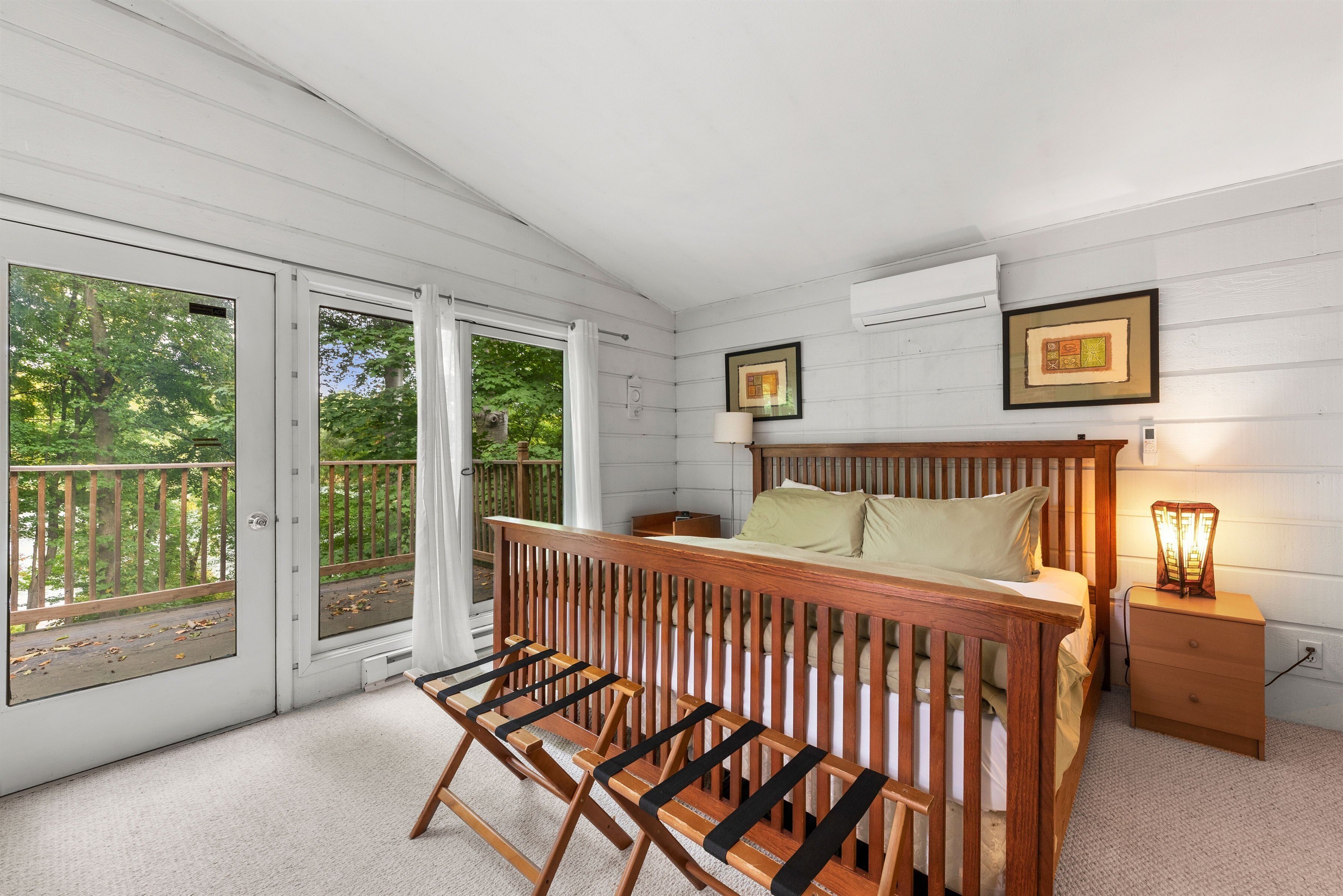 Master bedroom overlooking lake with California King Bed on second floor