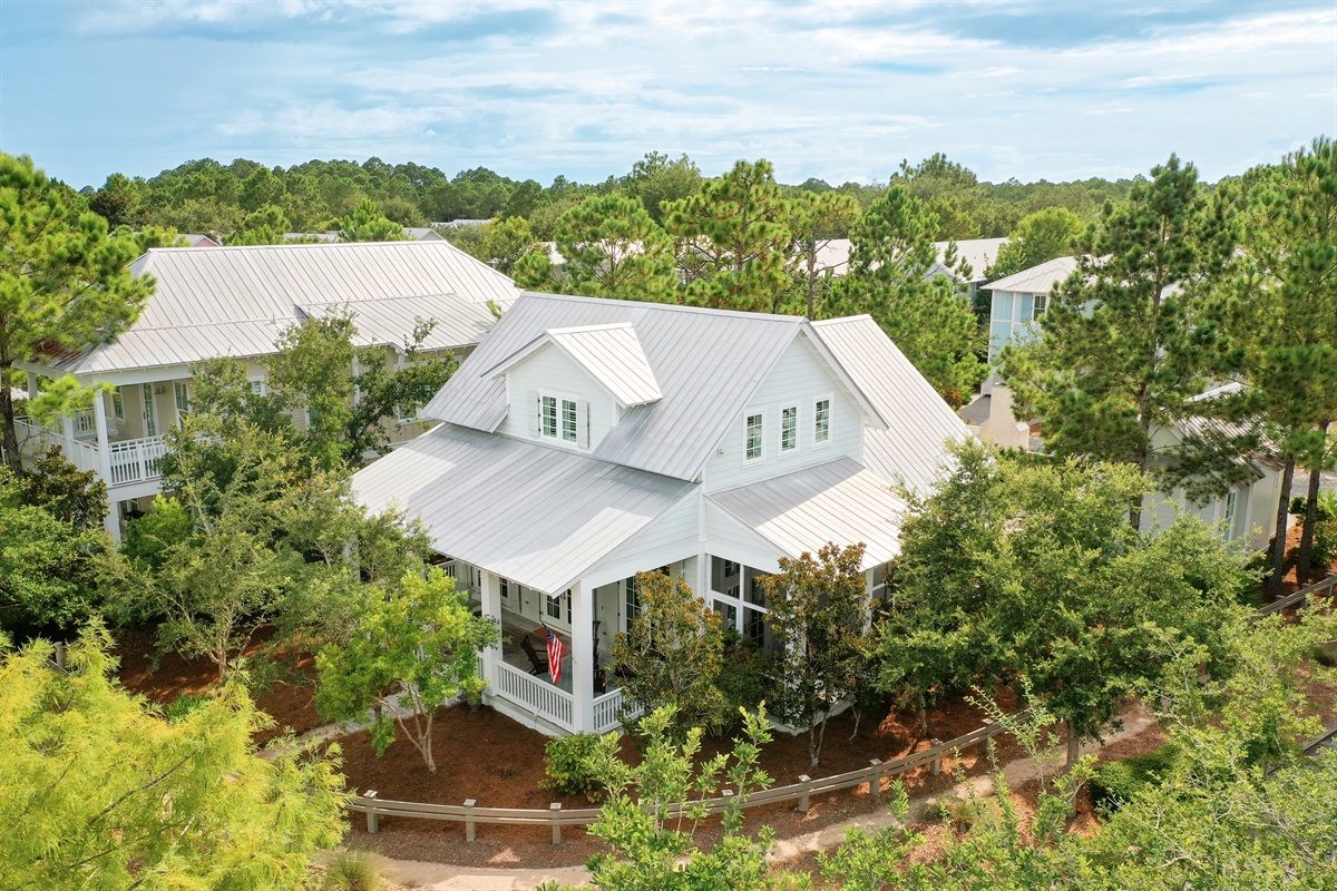Ariel view of cozy corner lot with plenty of space and privacy. 