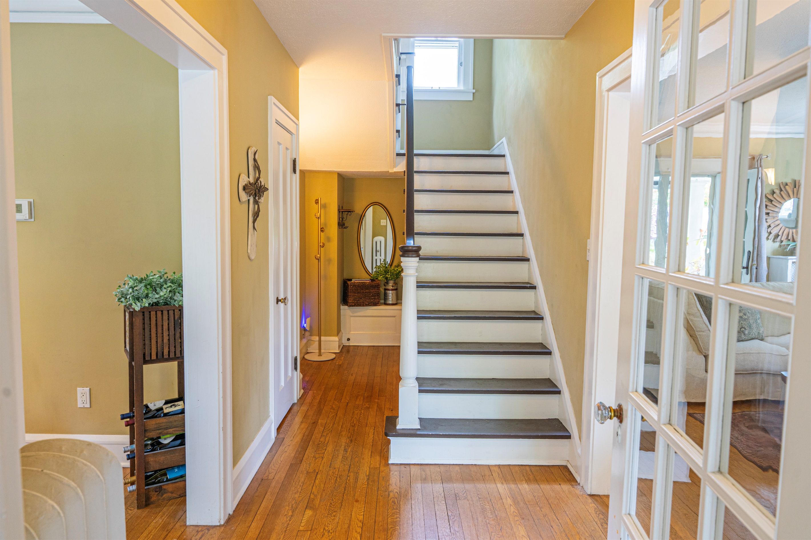 Entry: Hall to Down Stairs Bath and Stairway to Second Floor Bedrooms.