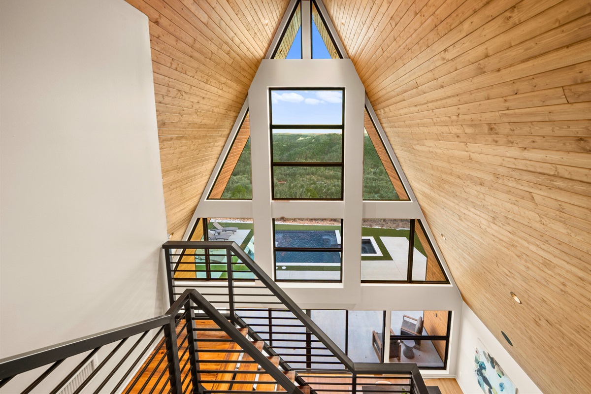 Heading upstairs feels like part of the experience here, with the A-frame architecture creating such a cool, open look that&rsquo;s bright and airy.