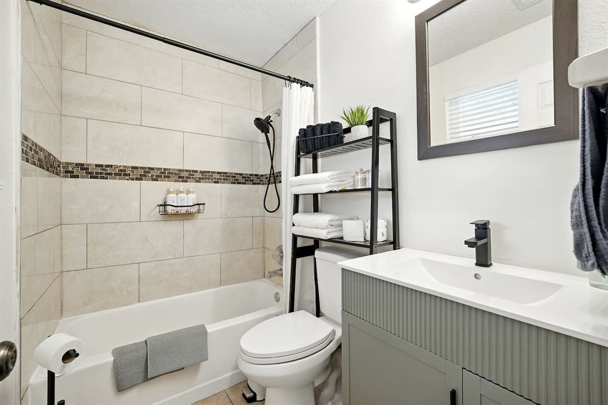 Private master bathroom with tub and shower