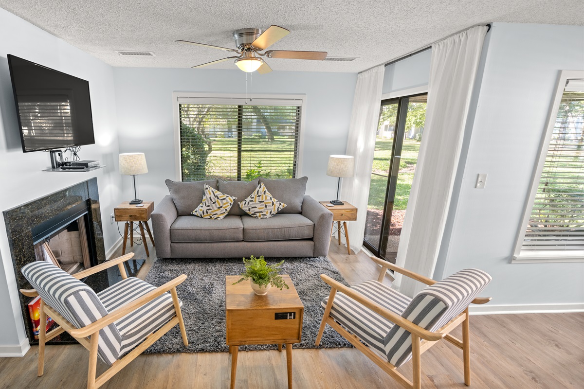Cozy living room with Fireplace and access to back patio