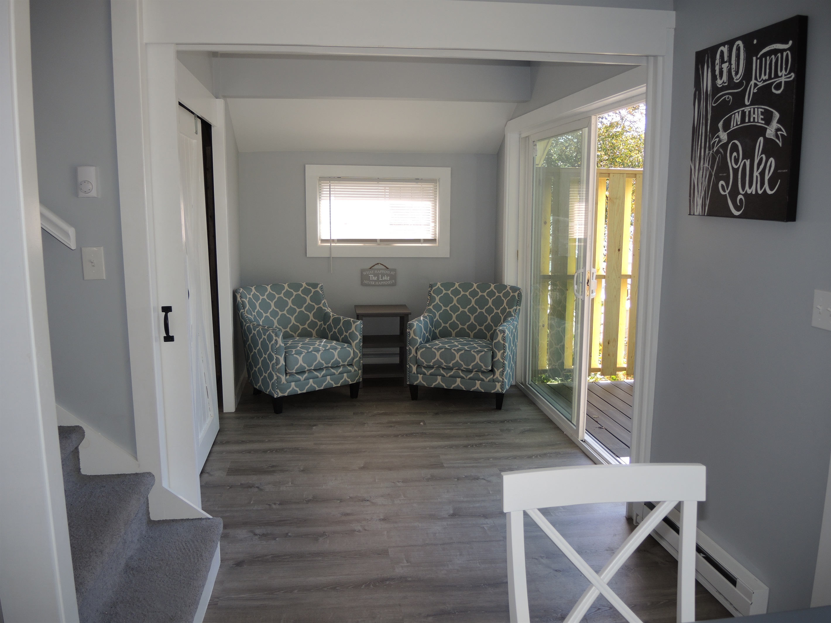 1st floor seating by doors to deck