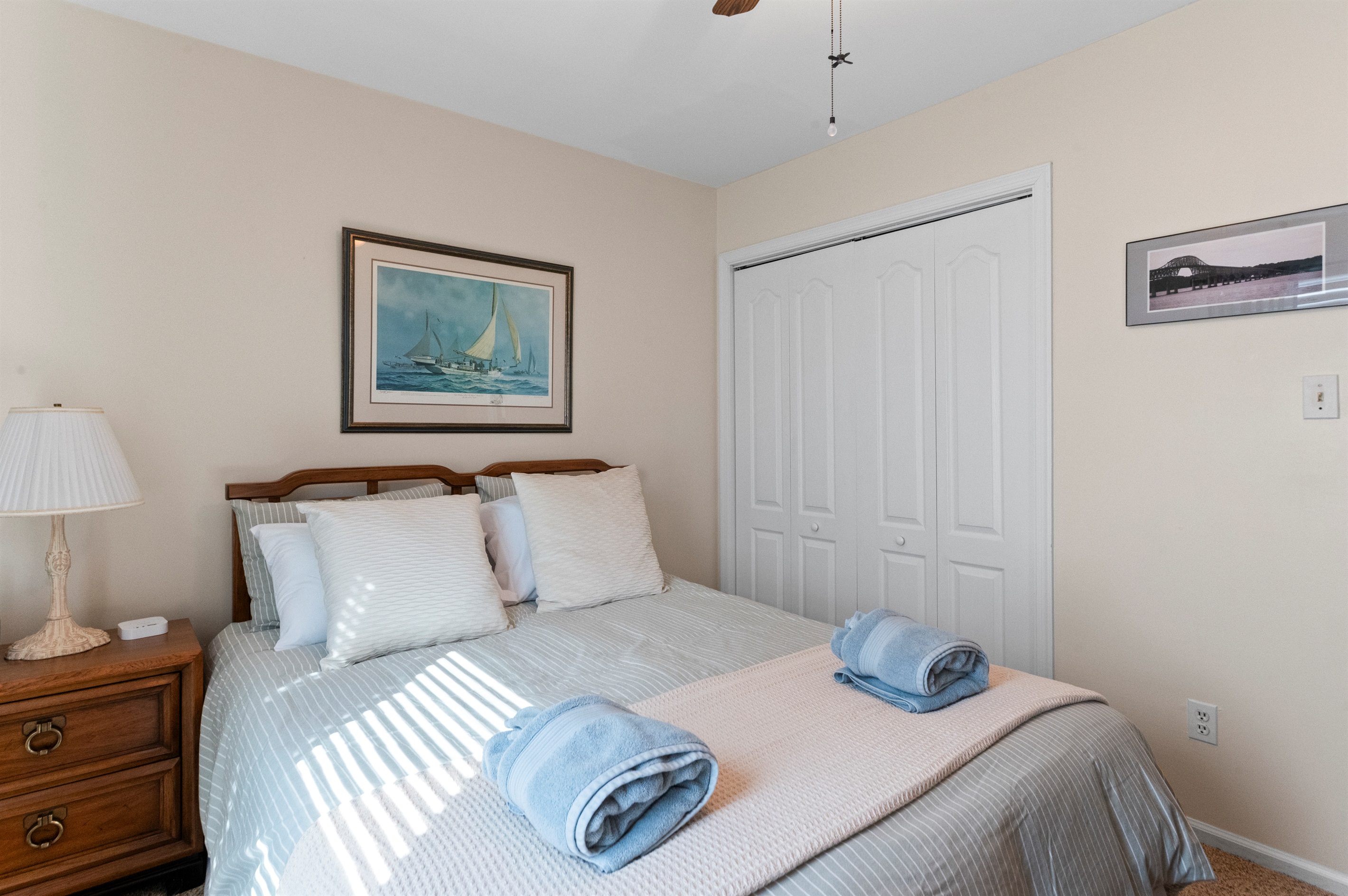 Bedroom Queen 2: Bright space with nautical decor and soft linens for a restful retreat!