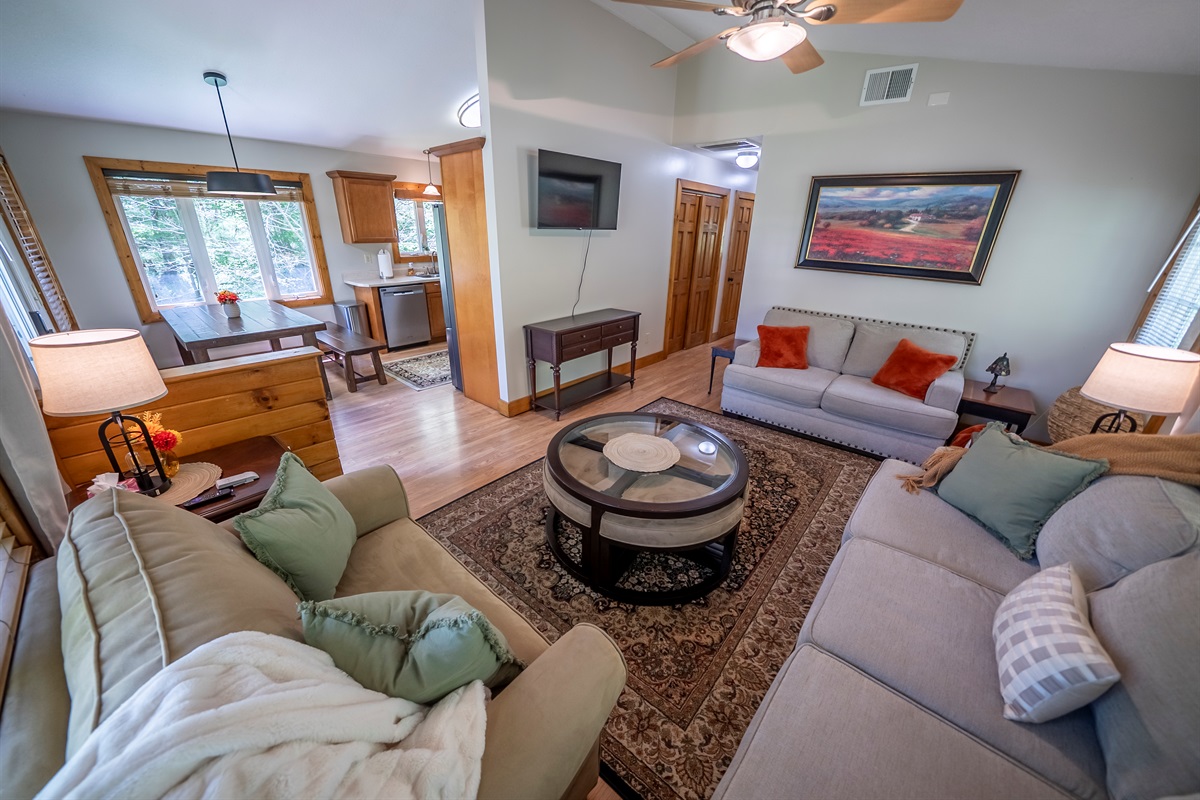 Settle in with a movie on the Smart TV or gather around the coffee table for games; this living room is made for relaxing and connecting.