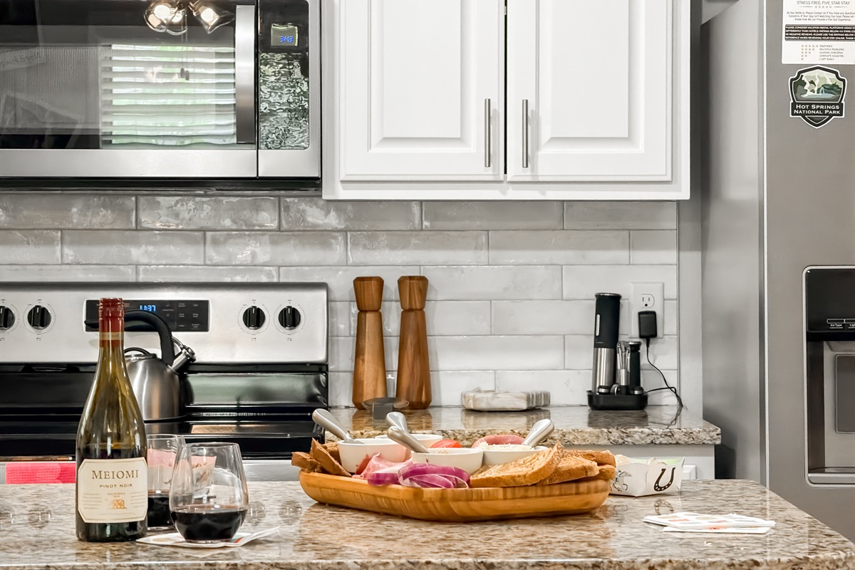 With a Keurig drip/pod coffee machine and stainless steel appliances.