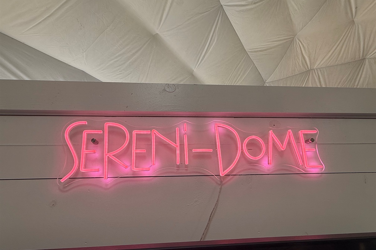 Sereni-Dome Neon Sign in Living Room
