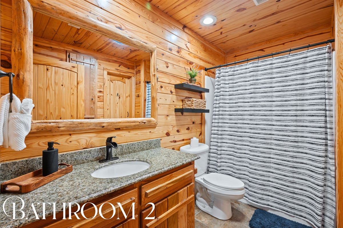 A spacious vanity and thoughtful layout in the second bathroom make getting ready easy and convenient.