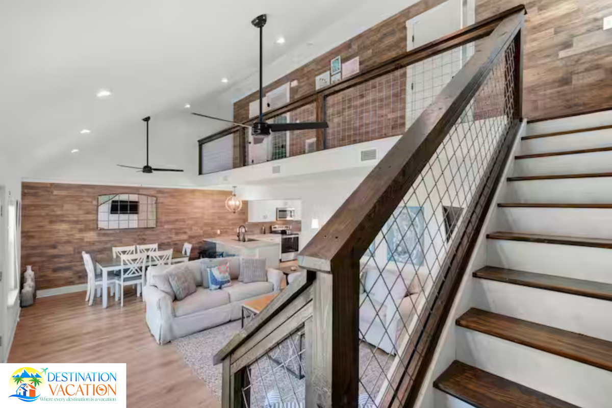 Soaring ceilings and coastal style create an inviting atmosphere.