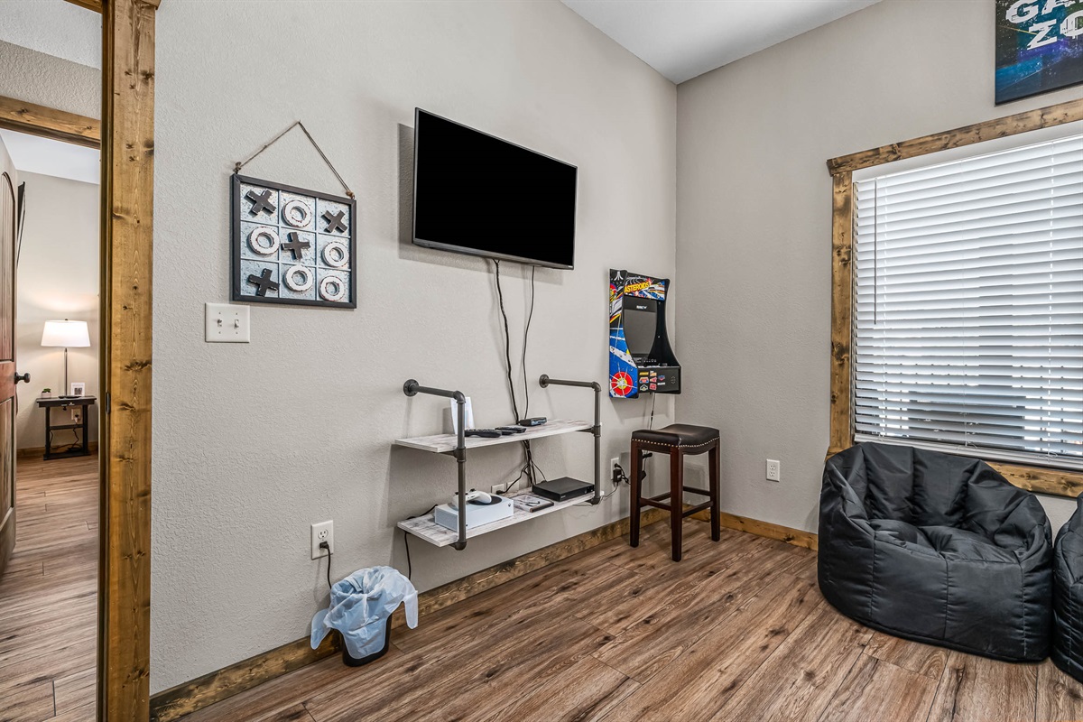 Bunkroom #1 has an Xbox one and wall mounted arcade game