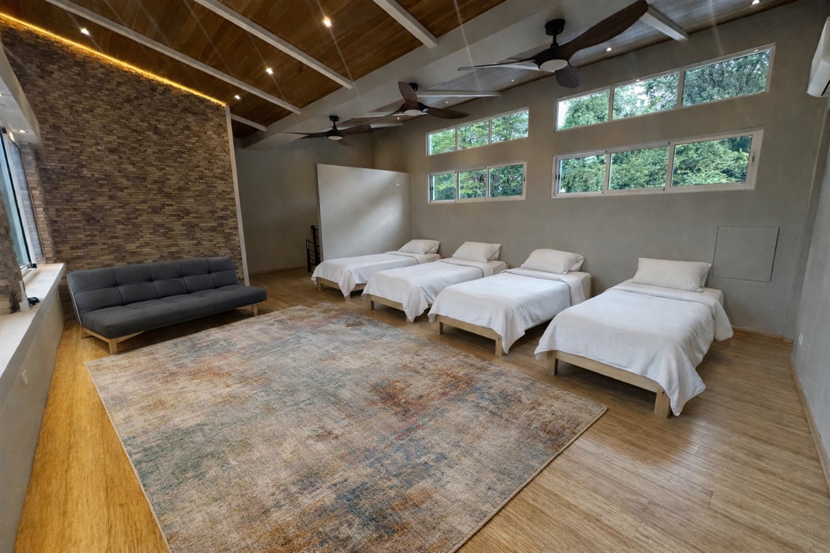 Turn the Yoga Room into kids retreat with 4 Twin beds.