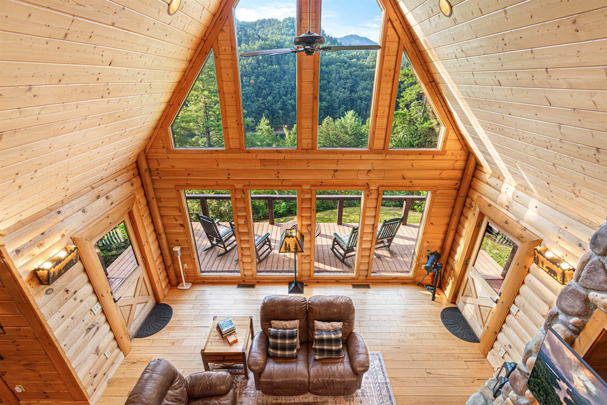 View from Upstairs: Soaring ceilings and scenic views invite you to relax in style!