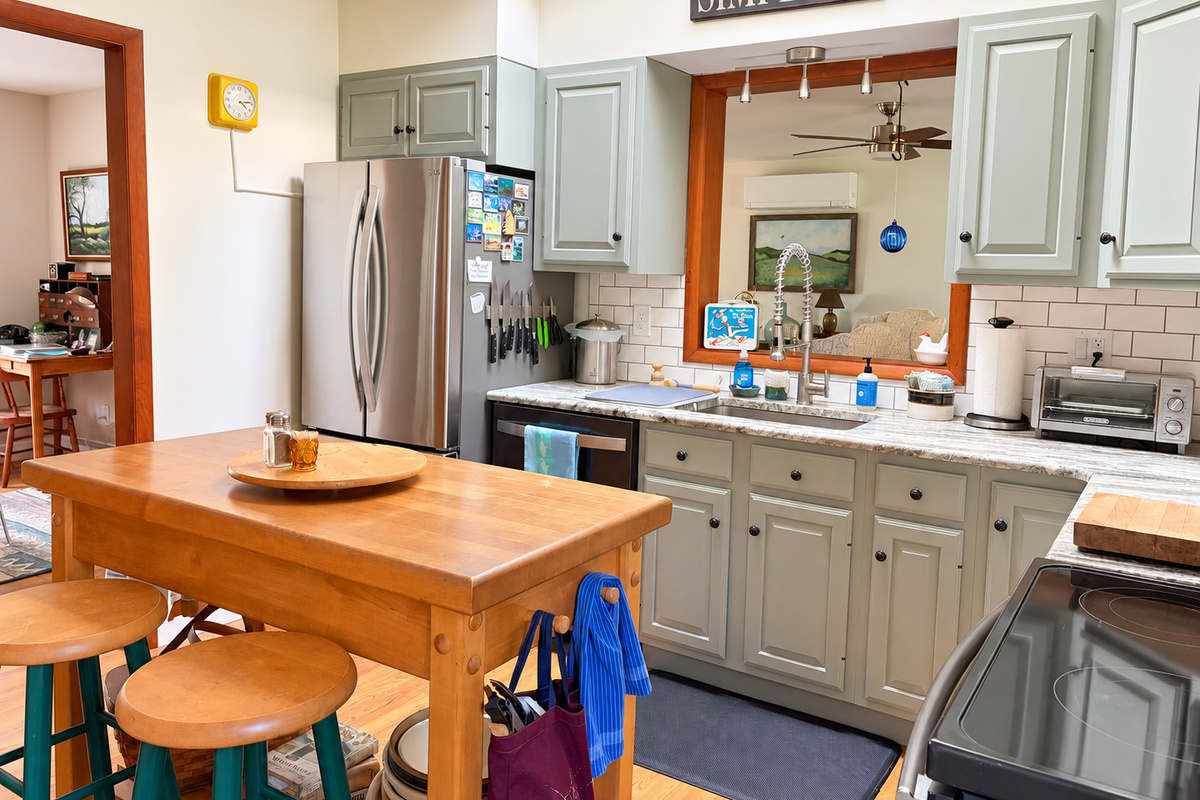 Kitchen pass-through to the living room.