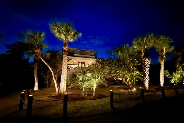 Outdoor lighting throughout the property makes Coral Castaway feel like a resort