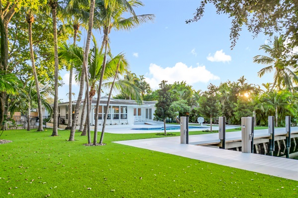 The entire backyard is fenced in and encompassed with plants to give great privacy