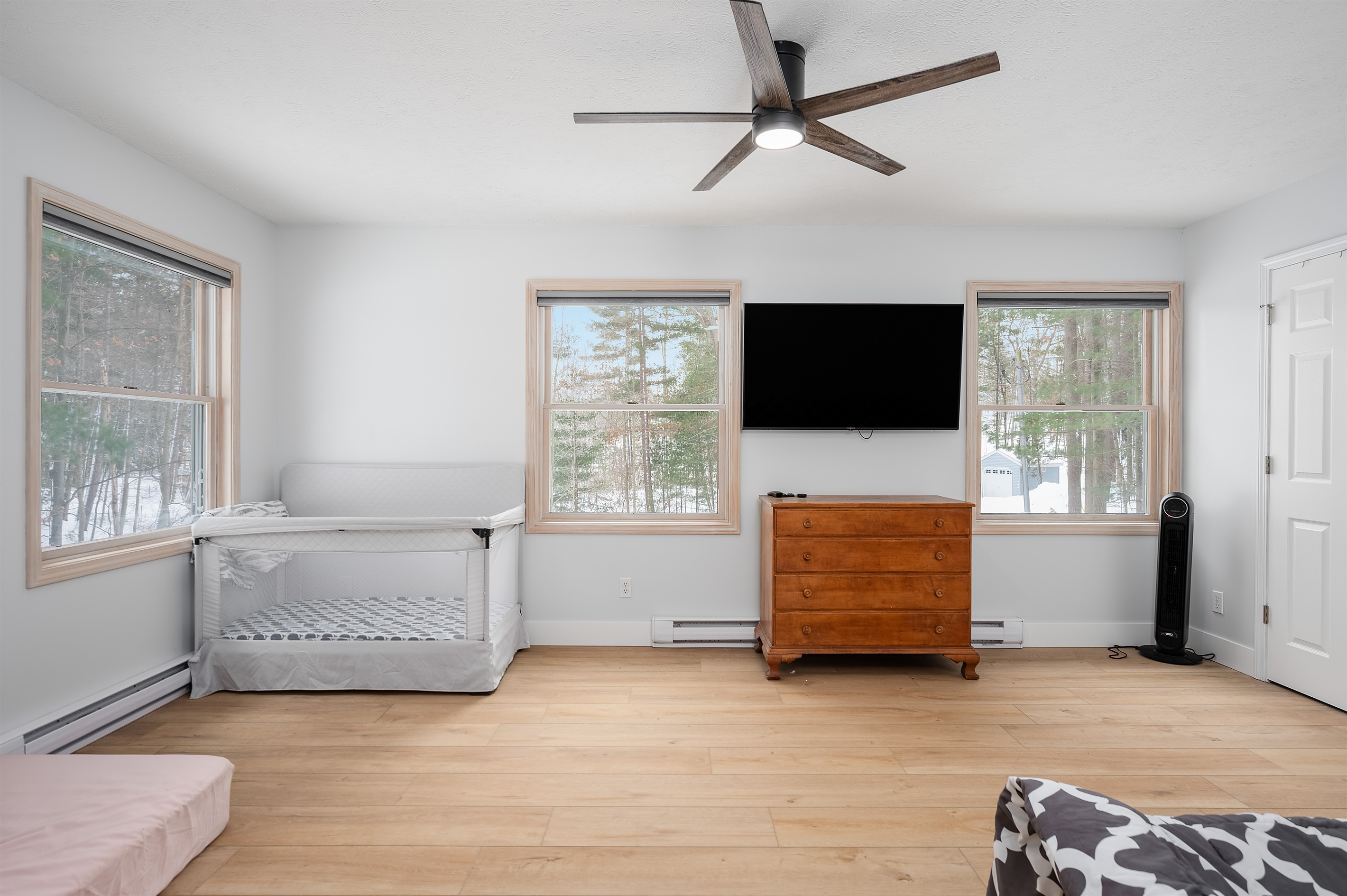 Upstairs family room with TV and flexible sleeping space