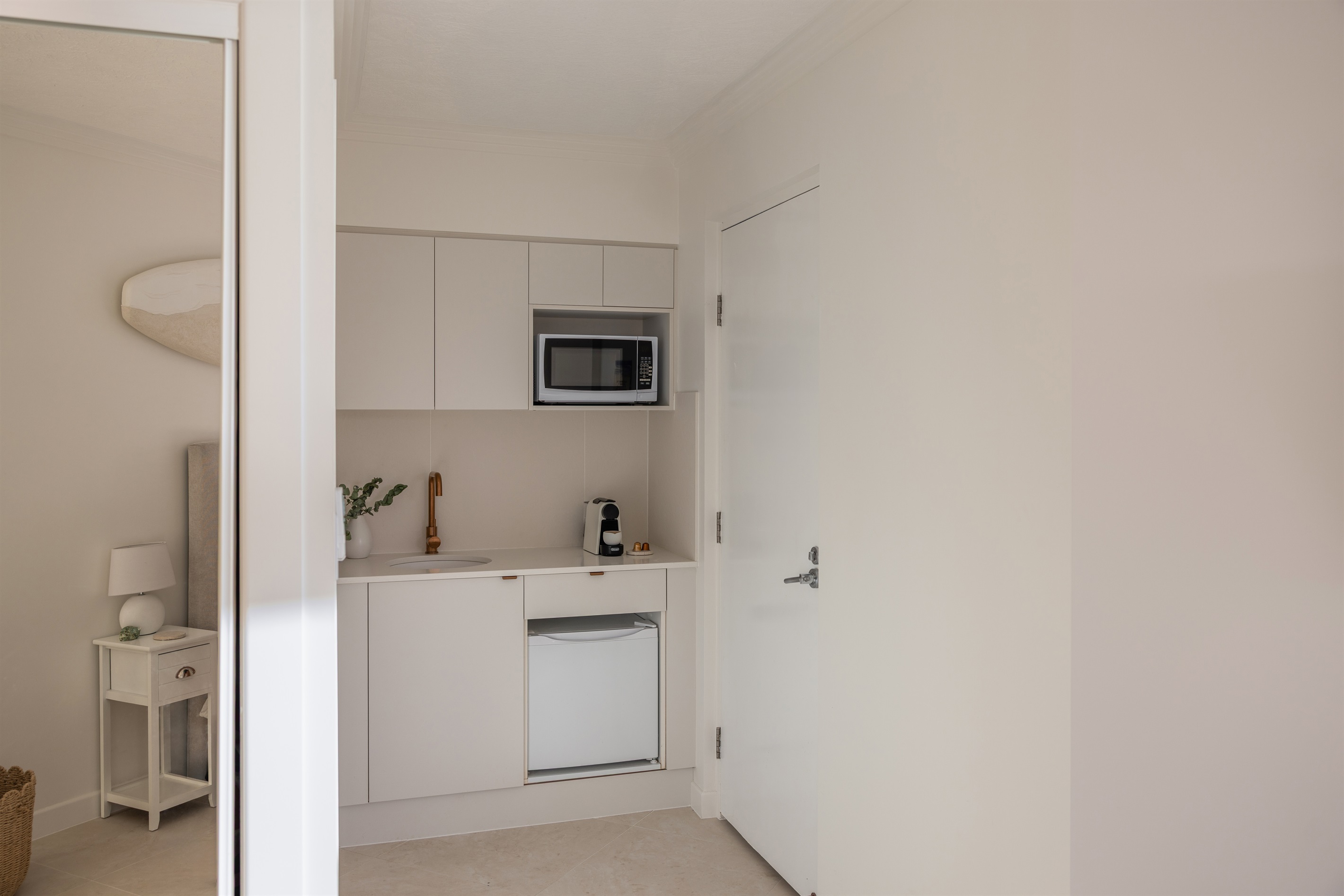 Newly renovated kitchenette with a microwave, fridge and Nespresso for easy holiday meals and relaxed mornings.