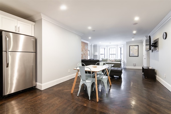 Full size fridge. Kitchen area. 