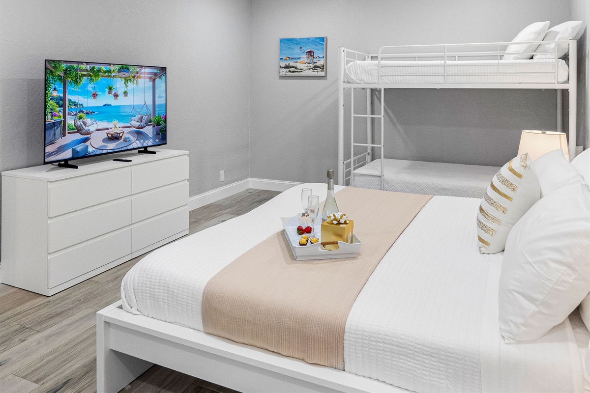 This well-appointed bedroom is as stylish as it is functional—ideal for extended stays or quick weekend escapes with the family.
