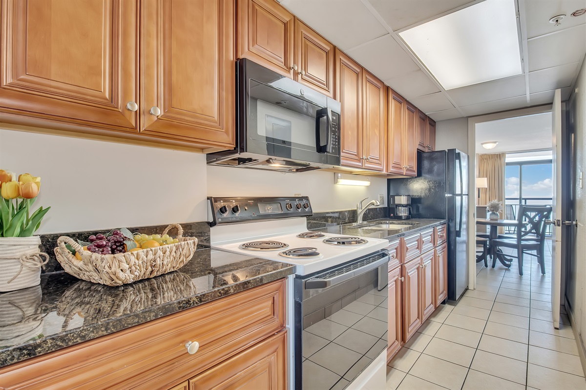 Modern and stylish kitchen. Got all the kitchen essentials. Prepare your meals while enjoying the oceanview.