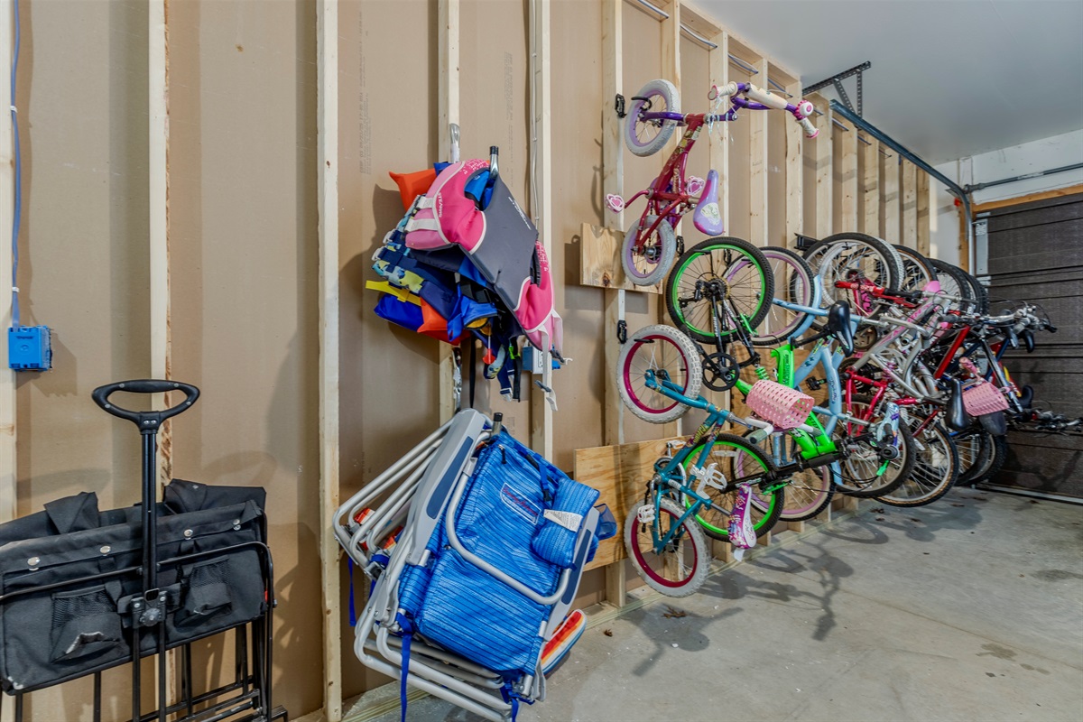 The other side of the garage game room is equipped with outdoor activities and a grill to use during your stay!