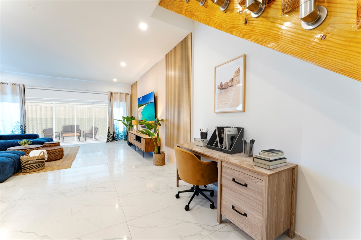 Featuring sleek tile floors, wood accents, and modern lighting throughout