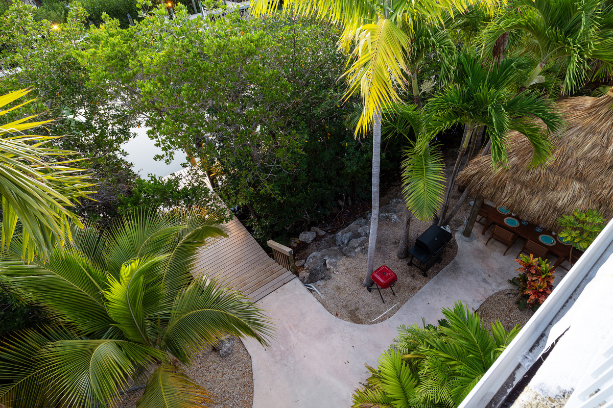 Surrounded by mature tropical trees, located two blocks from Sombrero beach.