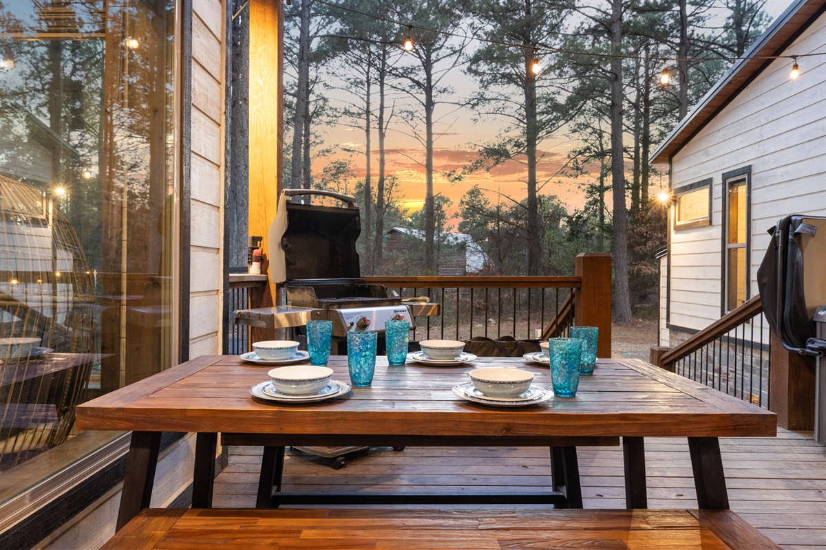 Dine, laugh, and linger longer, the perfect patio for meals and moments under the lights.