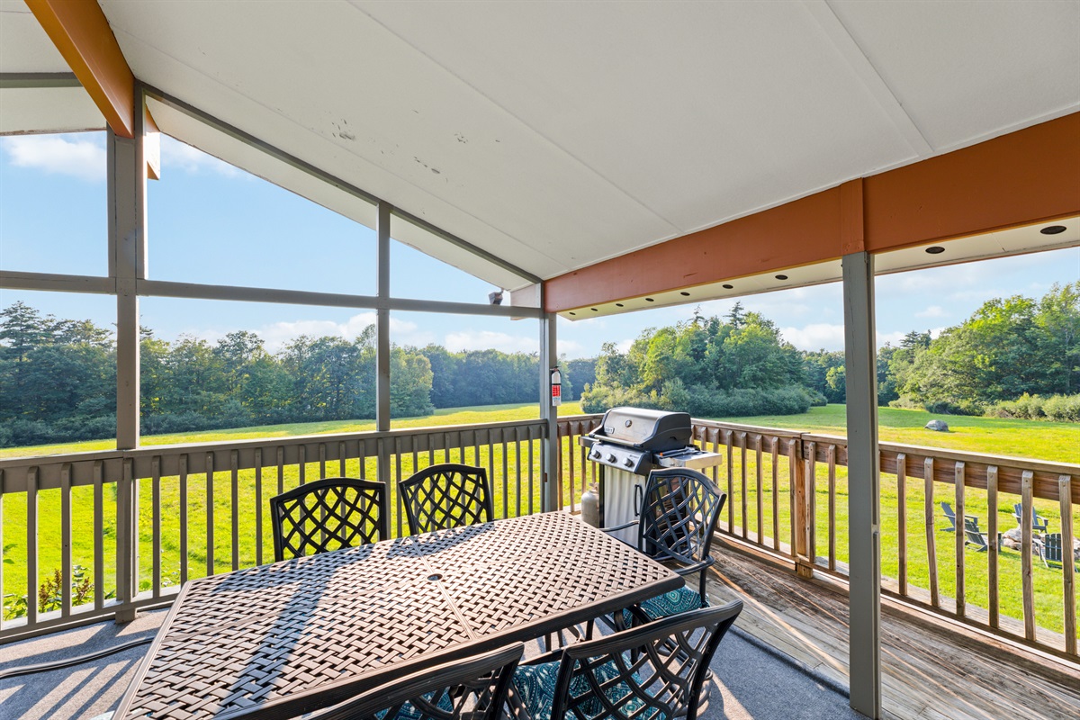 Covered Deck/Porch off upstairs livingroom overlooking field