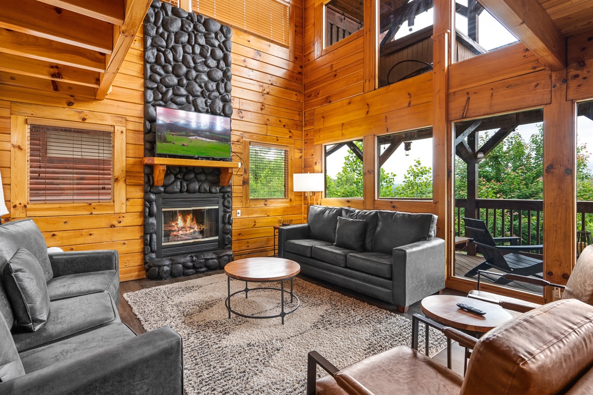 Gather in the open living room with panoramic windows