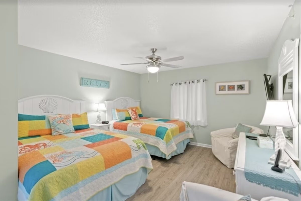 The first bedroom you'll encounter upon entering the condo has 2 queen beds!