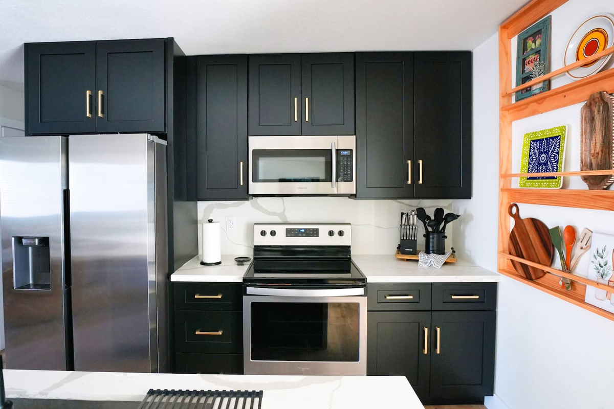 A fully stocked kitchen ready for quick bites and group-size meals.  