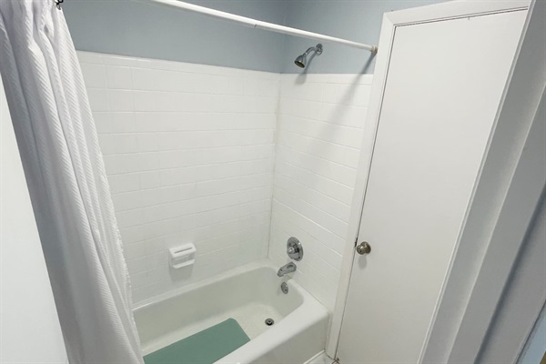 TUB & SHOWER     tub & shower combo located between the two 1/2 baths.